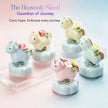 Five ceramic Heavenly Steed horse figurines with floral appliques in light blue, ivory, green, mint, and pink
