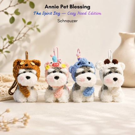 Four grey-and-white plush Spirit Dog keychains, each wearing a different animal-themed hood