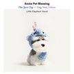 Grey-and-white plush Spirit Dog keychain wearing a blue elephant hood and wrap