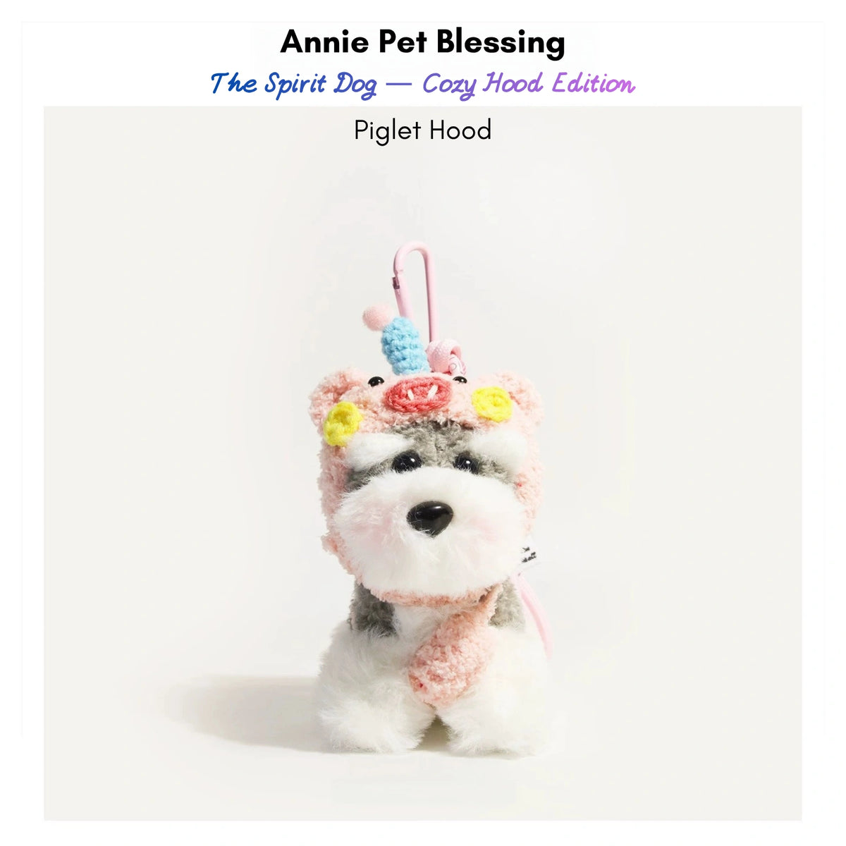 Grey-and-white plush Spirit Dog keychain wearing a pink piglet hood and scarf