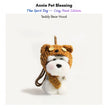 Grey-and-white plush Spirit Dog keychain wearing a brown teddy bear hood and scarf