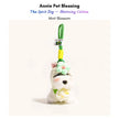 Grey-and-white plush Spirit Dog keychain wearing a mint-green crocheted flower and matching collar, Mint Blossom edition