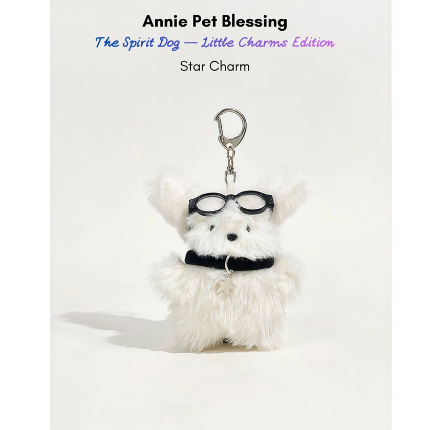 White fluffy plush charm keychain wearing glasses and a collar with a star-shaped silver charm