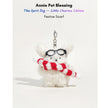 White fluffy plush charm keychain wearing glasses and a red-and-white striped scarf