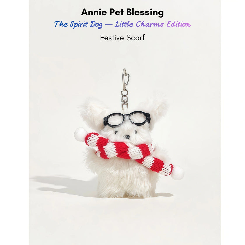 White fluffy plush charm keychain wearing glasses and a red-and-white striped scarf