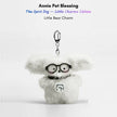 White fluffy plush charm keychain wearing glasses and a collar with a bear-shaped silver charm