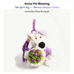 Westie plush keychain wearing a purple sweater, beret, and glasses, holding a crocheted lavender rose bouquet