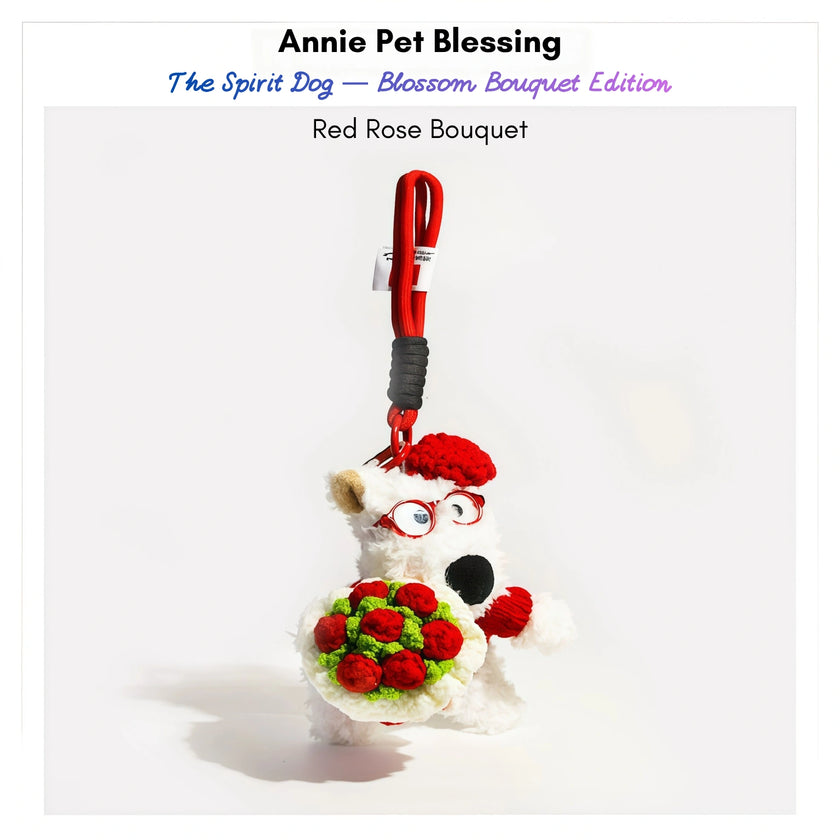 Westie plush keychain wearing a red sweater, beret, and glasses, holding a crocheted red rose bouquet