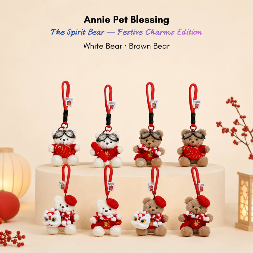 Eight plush Spirit Bear keychains in white and brown, each wearing a different festive accessory