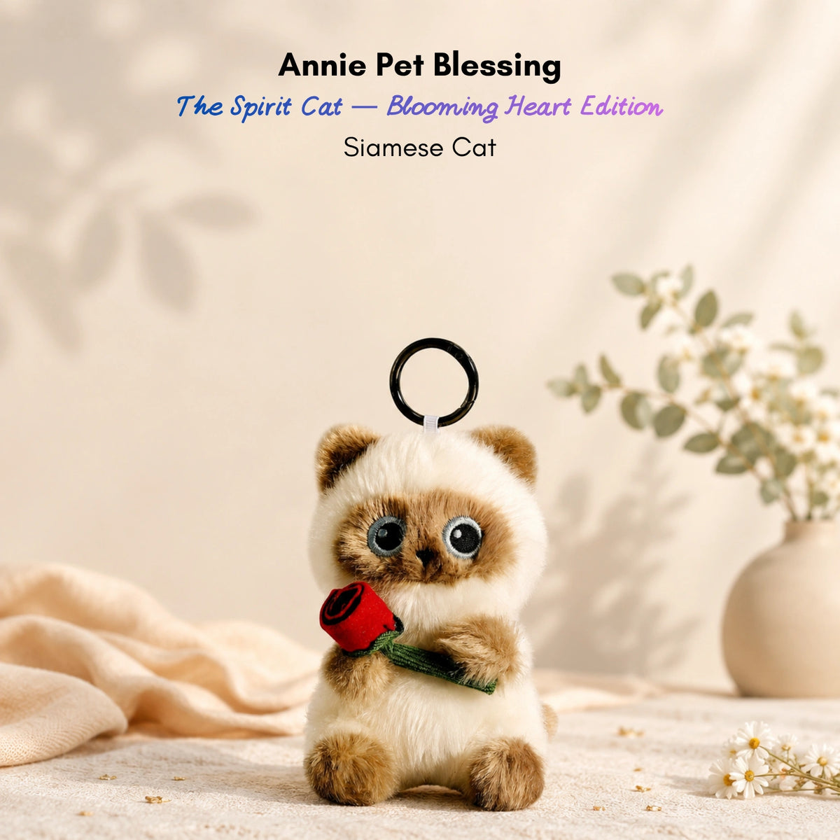 Cream Siamese-style plush Spirit Cat keychain holding a red velvet rose