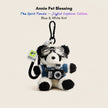 Plush Spirit Panda keychain wearing goggles and a blue-and-white striped sweater, holding a toy camera