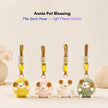 Four plush Spirit Sheep keychains in yellow, pink, white, and sage green
