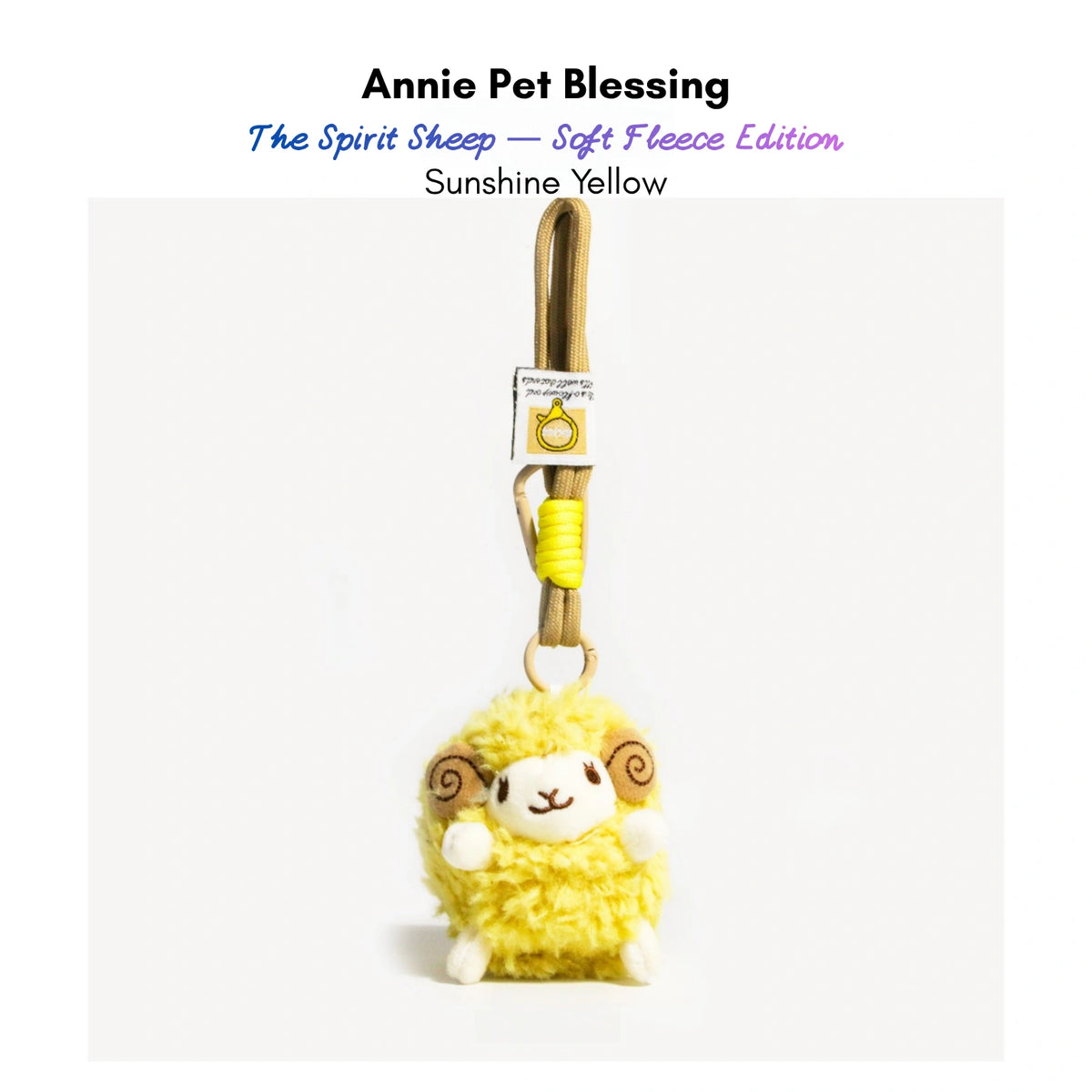 Yellow plush Spirit Sheep keychain with curled brown horns