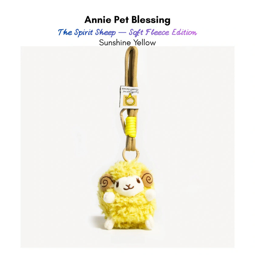 Yellow plush Spirit Sheep keychain with curled brown horns