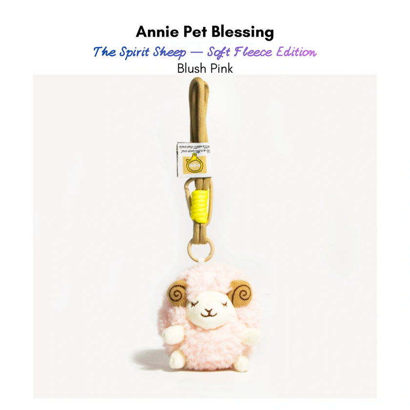 Pink plush Spirit Sheep keychain with curled brown horns