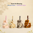 Four plush Spirit Rabbit keychains in pink, tan, gray, and brown, each wearing a floral bow