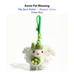 White plush Spirit Rabbit keychain wearing a green bow, holding a yellow and pink rose bouquet