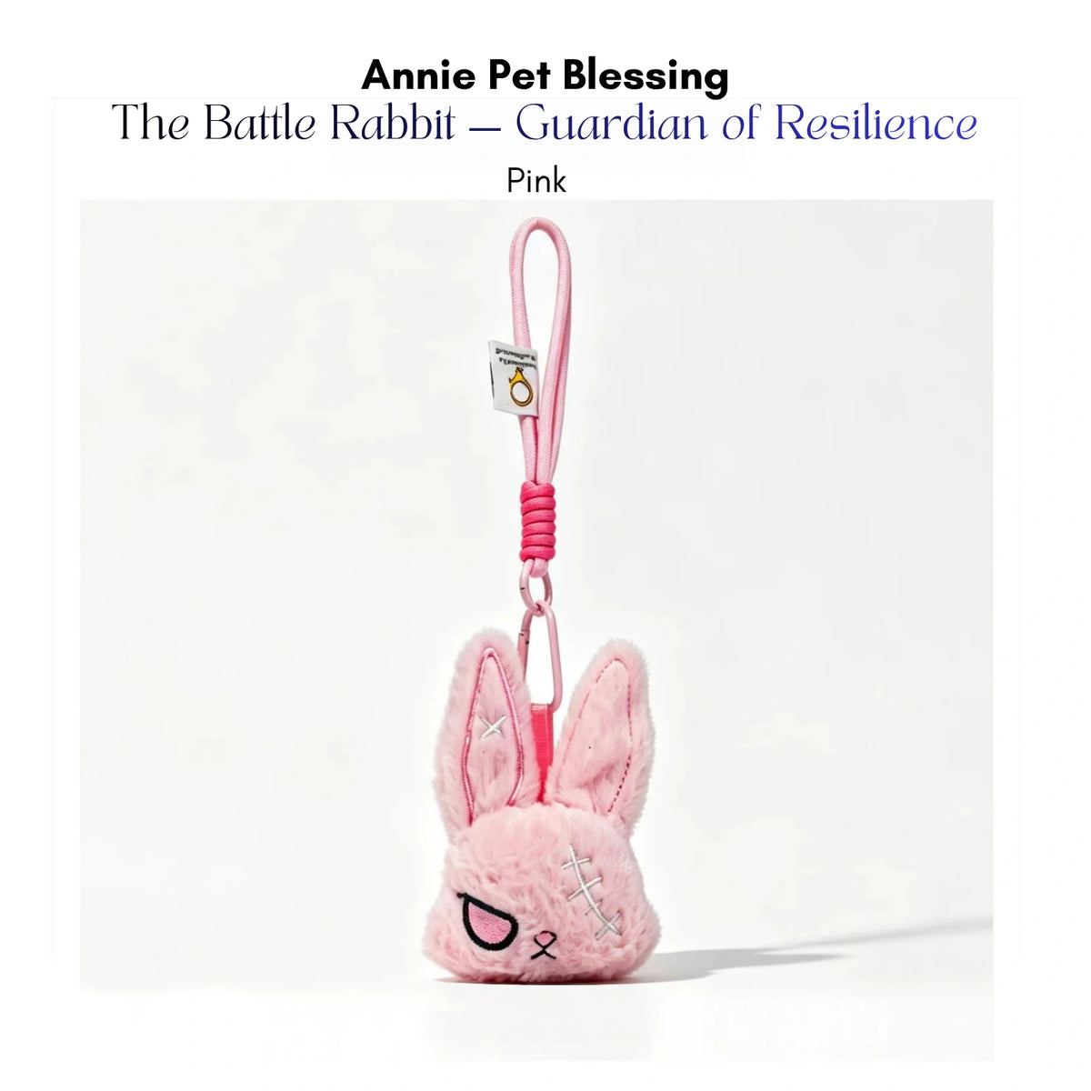 Pink plush Battle Rabbit keychain with white stitched eyes, Pink edition