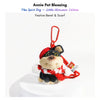 Black plush Spirit Dog keychain wearing a red crocheted beret and a red-and-white striped scarf