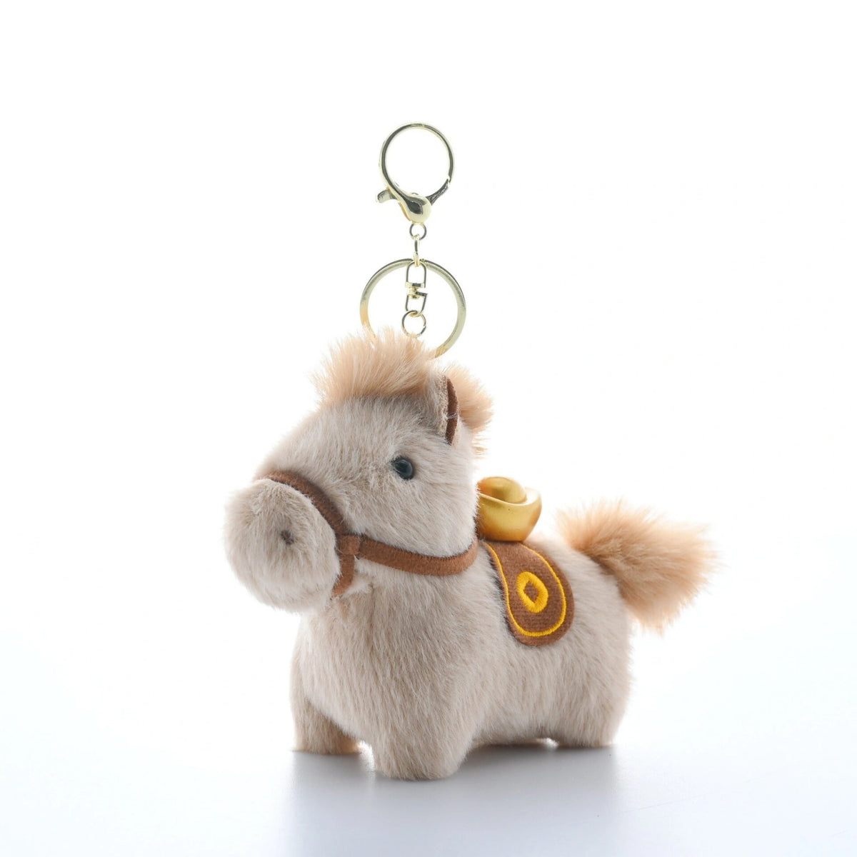 Beige plush Heavenly Steed horse keychain with a gold ingot charm, front-facing pose