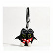 Close-up of a black plush bat-winged Yoyo keychain wearing goggles and a red-and-white striped scarf