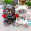Brown and Siamese-style plush Spirit Cat keychains together, each holding a red rose