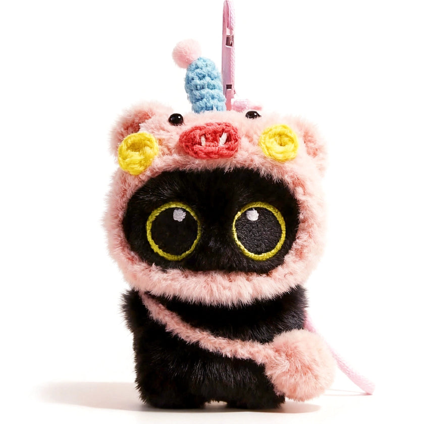 Yoyo plush keychain wearing a pink piglet hood, front view