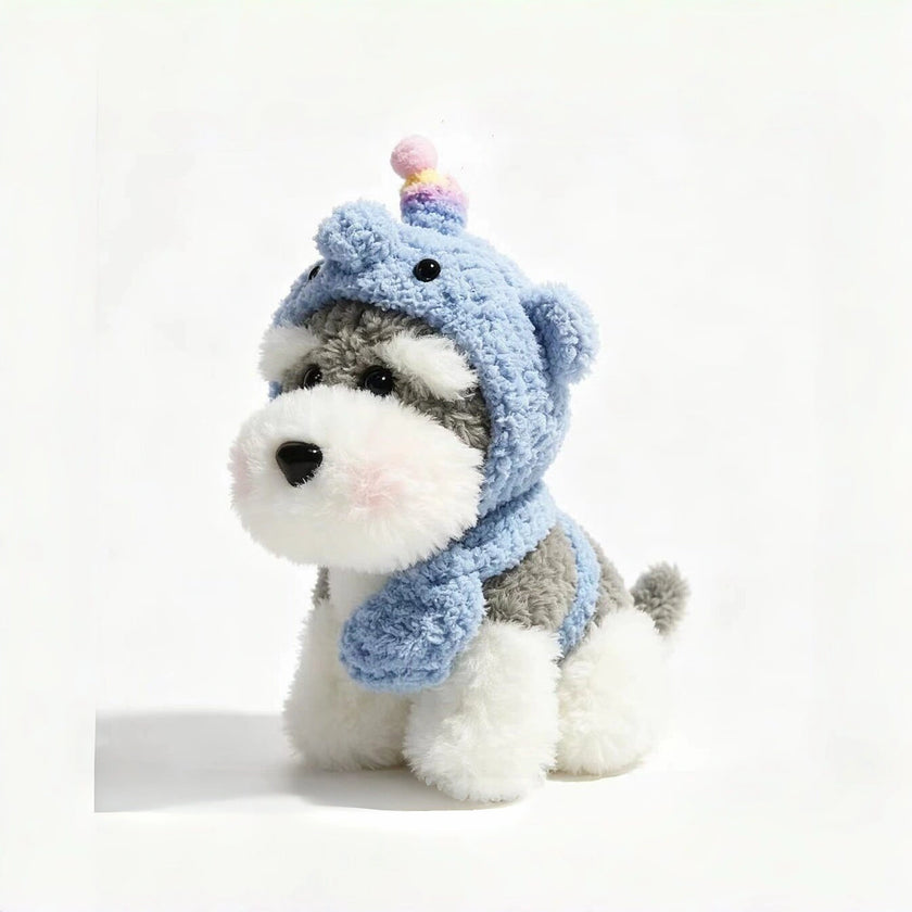 Grey-and-white plush Spirit Dog keychain wearing a light blue knitted hood with a pastel unicorn horn