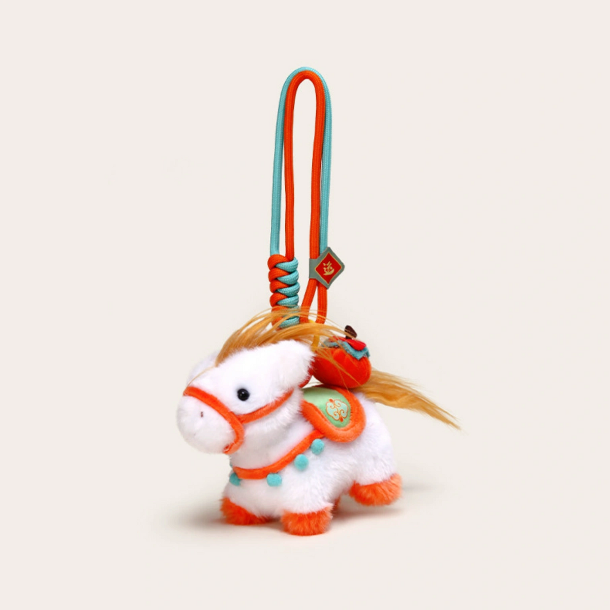 Four plush Heavenly Steed horse keychains displayed on white pedestal blocks of varying heights
